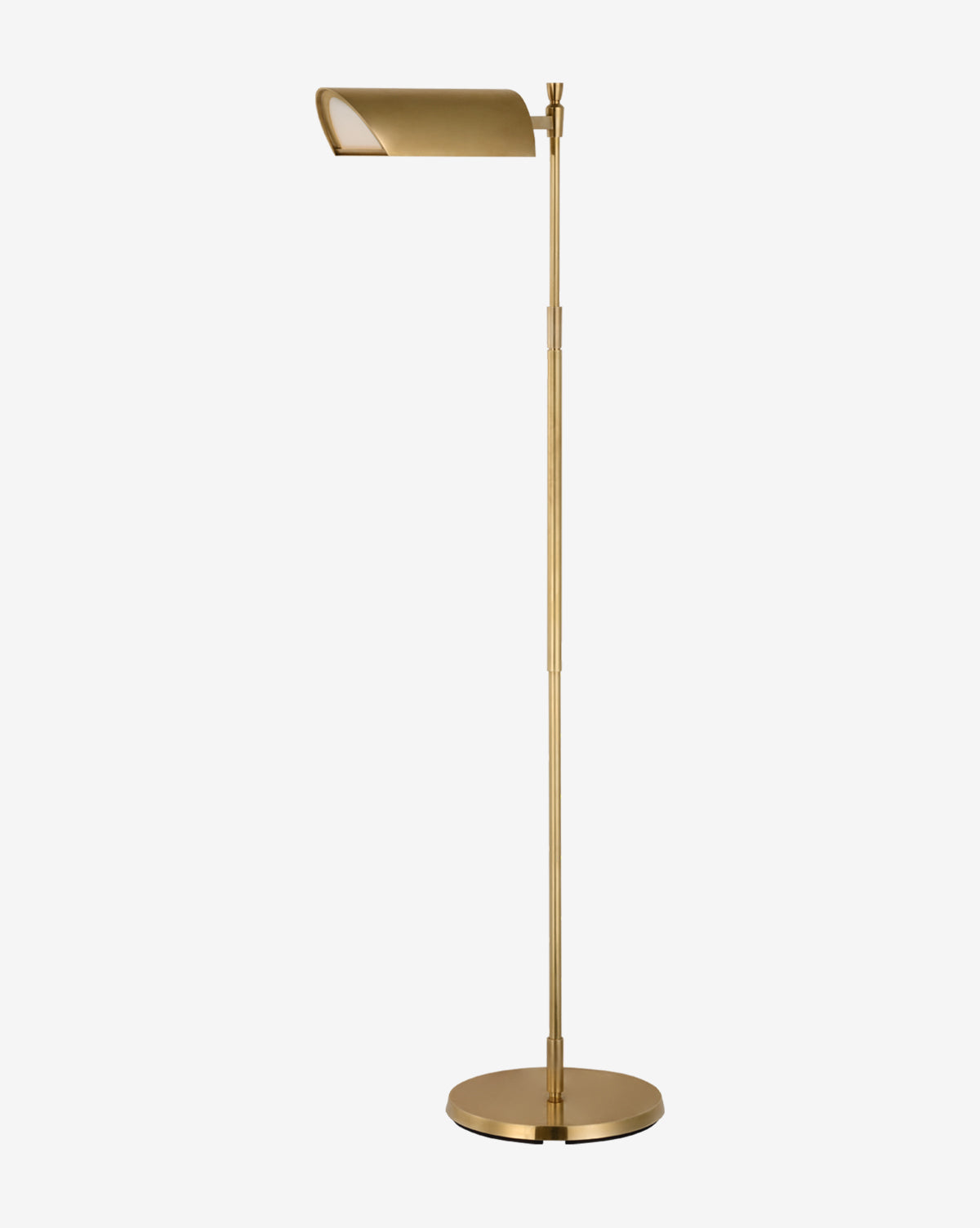 The Bravo Adjustable Pharmacy Floor Lamp features a modern brass finish, slim adjustable pole, and rectangular angled shade atop a round base—a sleek update on the classic pharmacy floor lamp, by McGee & Co.