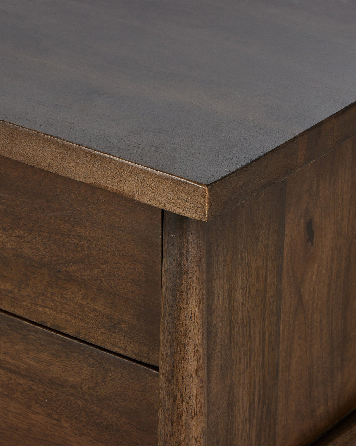 Close-up of the Bridgewater Nightstands corner, highlighting its smooth dark brown finish, rich wood grain, and precise edges—modern yet classic design with practical storage drawers for your bedroom, by McGee & Co.