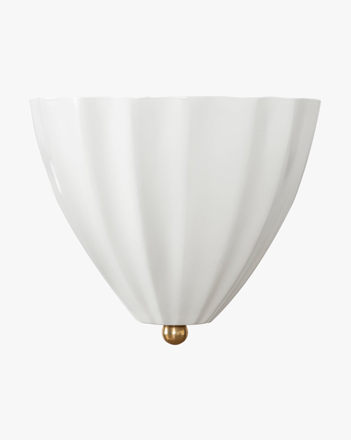 The Makerspalm Brigadier Wall Sconce is a white, semi-circular uplight with a fluted design and a small round brass accent at the base, shown against a plain white background. McGee & Co.