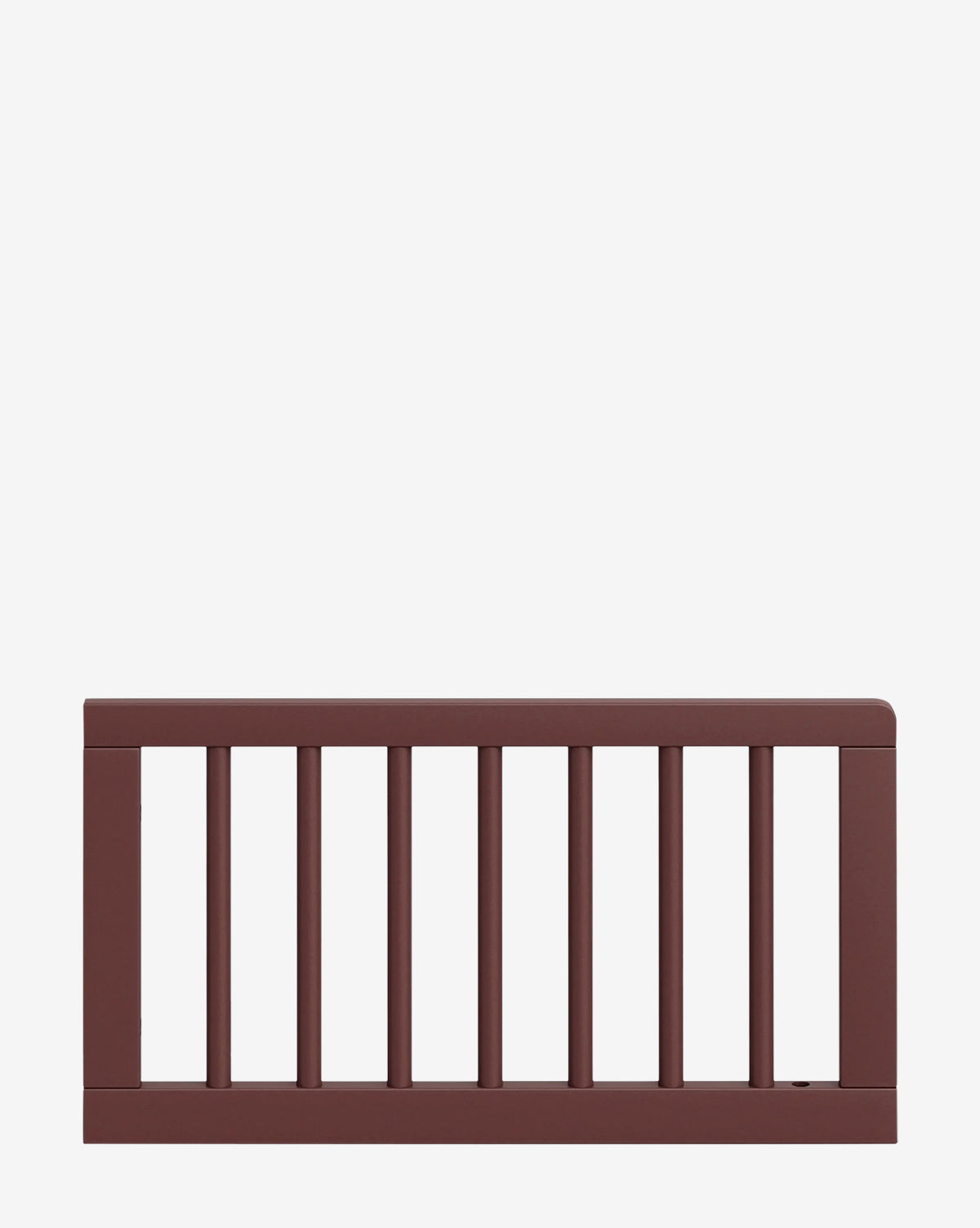A brown wooden safety rail with vertical slats, designed for use with the Brimsley Tambour Toddler Bed Conversion Kit, shown against a plain white background by McGee & Co.