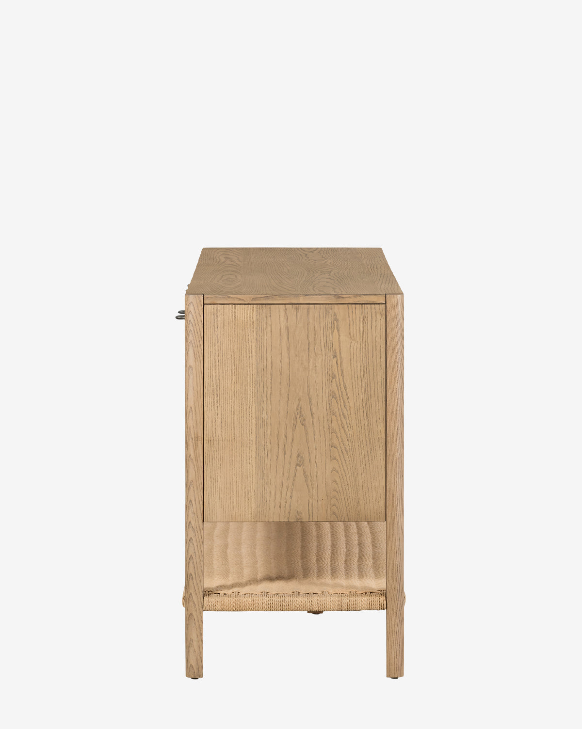 Side view of the Brio Sideboard, made from solid ash with Danish-inspired design, simple lines, a flat top, and a textured lower shelf. Shown against a plain white background, by McGee & Co.