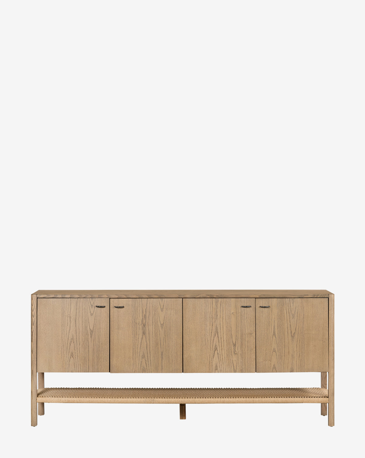 The Brio Sideboard is a light ash wood piece with four cabinet doors, an open lower shelf, adjustable shelves, and clean-lined Danish modern design, by McGee & Co.