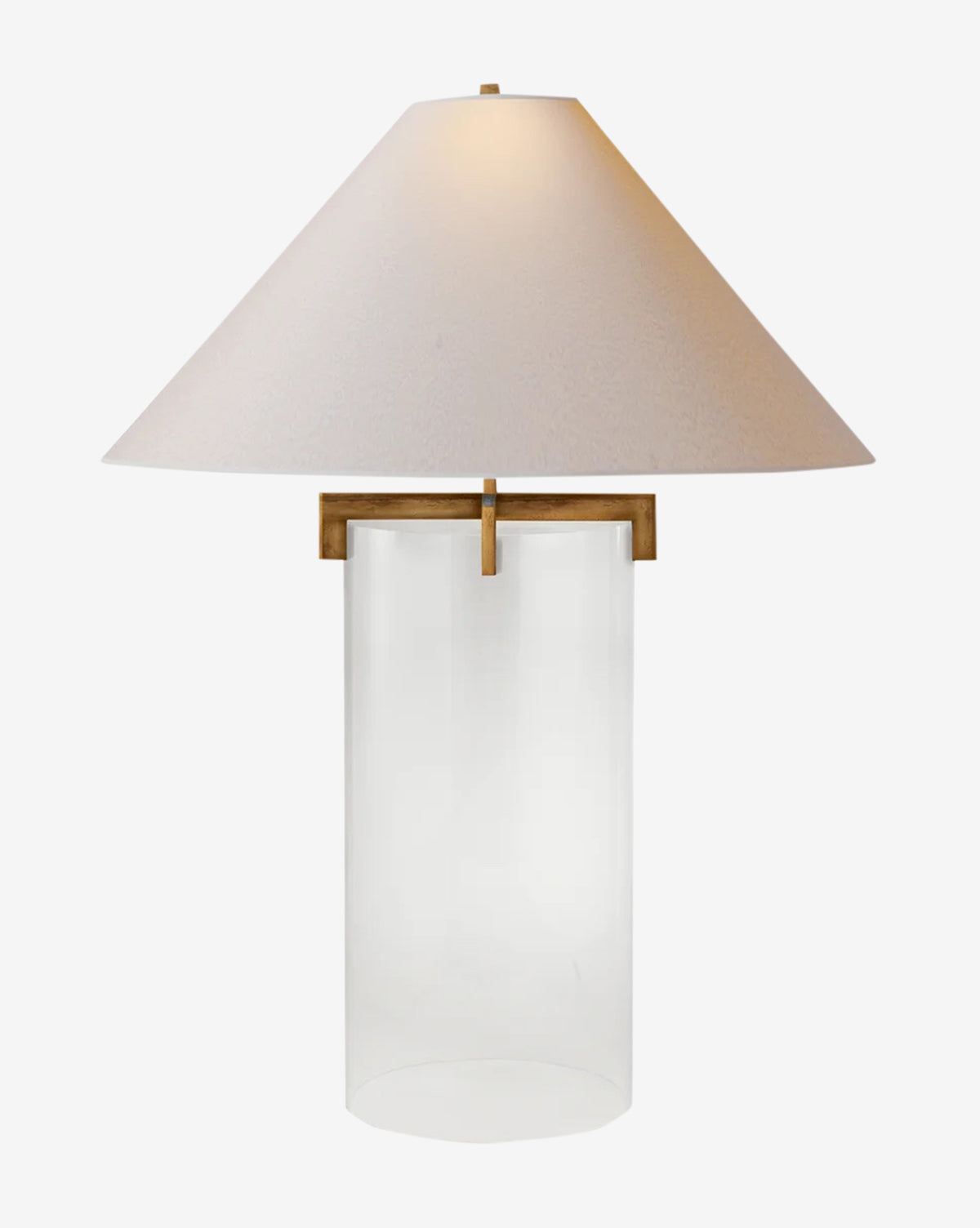 The Brooks Table Lamp by Visual Comfort & Co. Signature features a clear cylindrical glass base, wooden accent, and wide light beige fabric shade, showcasing modern style on a white background. McGee & Co.