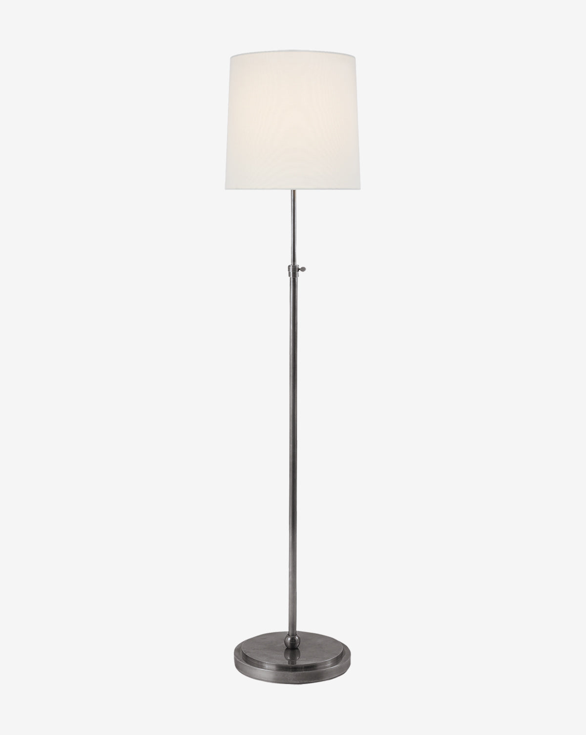 The Bryant Floor Lamp features a slim metal base and a round white linen shade, offering a classic look against a plain white background, by McGee & Co.