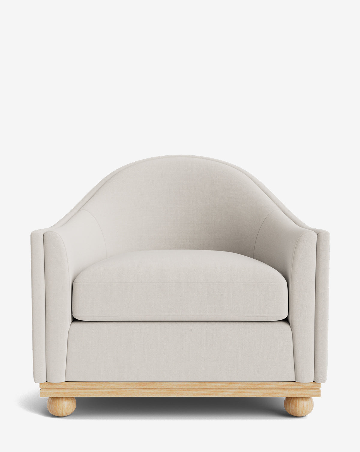 The Test Bunnell Lounge Chair (Copy) is a modern, customizable lounge chair with light beige upholstery, curved backrest, thick seat cushion, and a light wooden base—ideal for made-to-order furniture fans by McGee & Co.