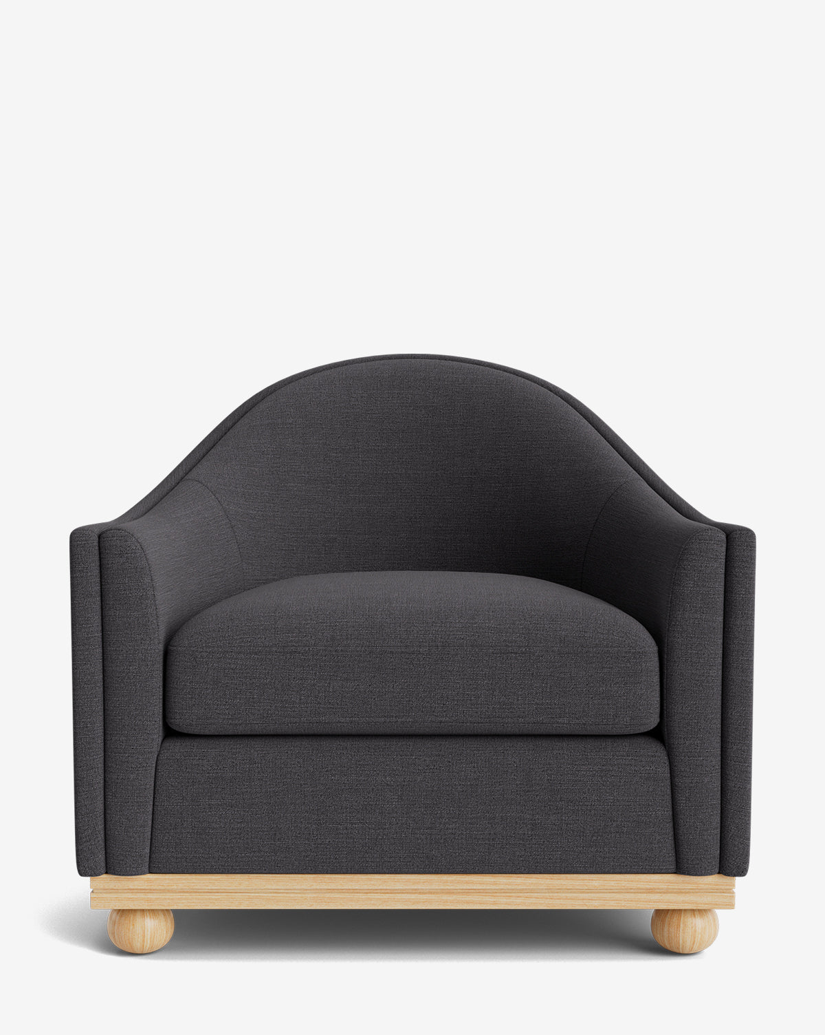 The Test Bunnell Lounge Chair (Copy) features a modern dark gray design with rounded arms and backrest, a thick seat cushion, and a light wooden base with spherical feet, shown against a plain white background by McGee & Co.