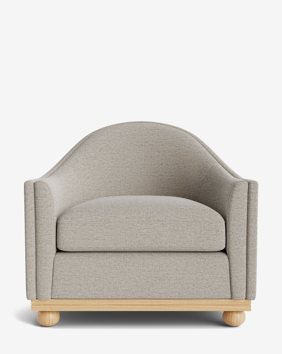 The Test Bunnell Lounge Chair (Copy) features light gray upholstery, a curved backrest, wide cushioned seat, and round wooden legs—a modern made-to-order piece shown against a white background by McGee & Co.
