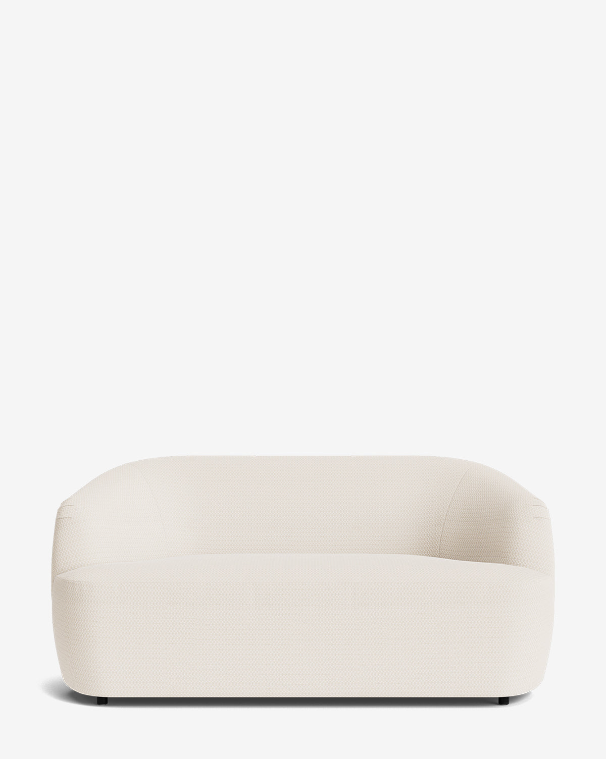 The Makerspalm Byron Settee 68 features a modern, minimalist design with a curved back and rounded edges, custom fabric upholstery, and sits low against a plain white background. McGee & Co.