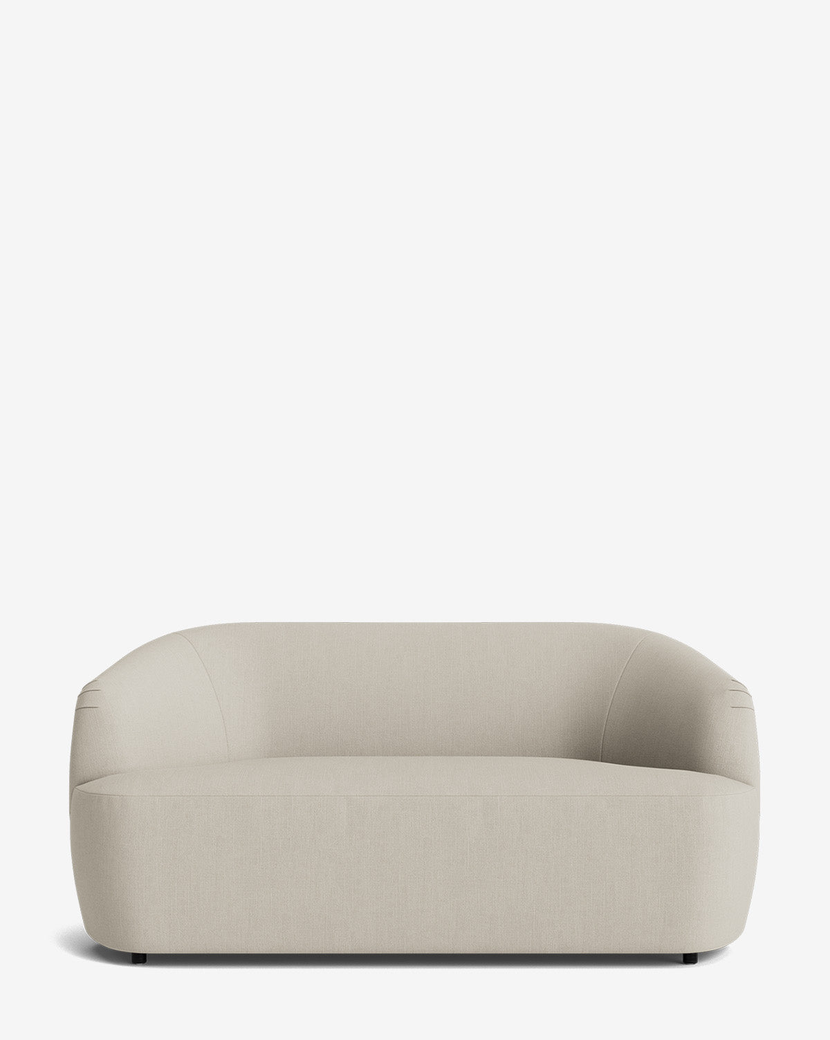 The Byron Settee 68 features a modern, minimalistic design in light beige with a curved back and armrests. Its seamless appearance and custom fabric are highlighted against a plain white background, by McGee & Co.