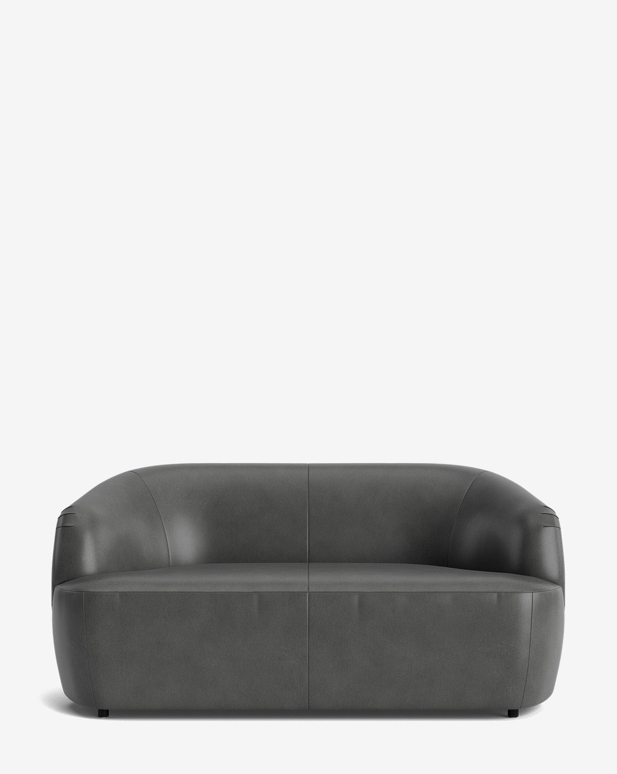 The Byron Settee 68 is a modern, dark gray sofa with a low back, armrests, smooth rounded edges, and minimalist design, shown against a plain white background by McGee & Co.