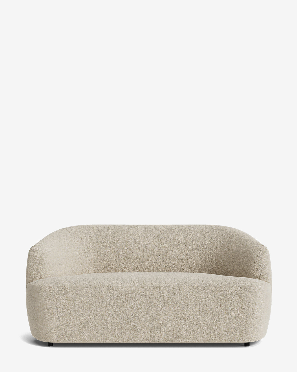 The Byron Settee 68 showcases a modern, minimalist design with rounded edges, a low backrest, and textured beige upholstery, set against a plain white background by McGee & Co.