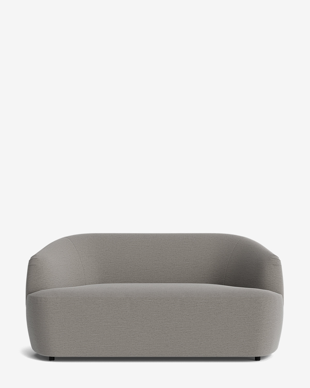 The Byron Settee 68 by Makerspalm is a modern, minimalist grey settee featuring a curved back, smooth rounded edges, and a low backrest, shown against a plain white background. McGee & Co.