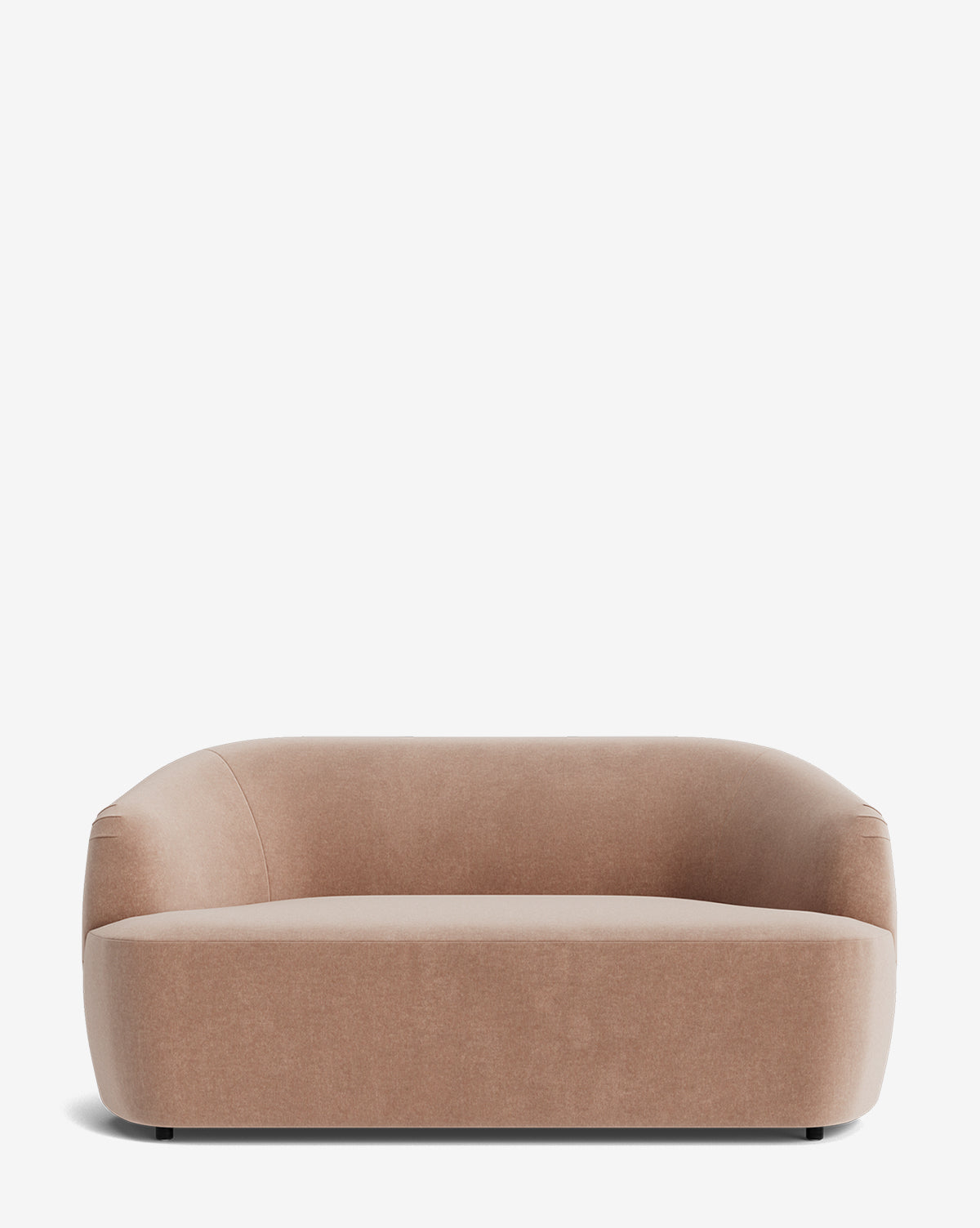 The Makerspalm Byron Settee 68 is a modern, light brown sofa with smooth curves, a low backrest, hidden legs, and custom fabric upholstery, shown against a plain white background by McGee & Co.