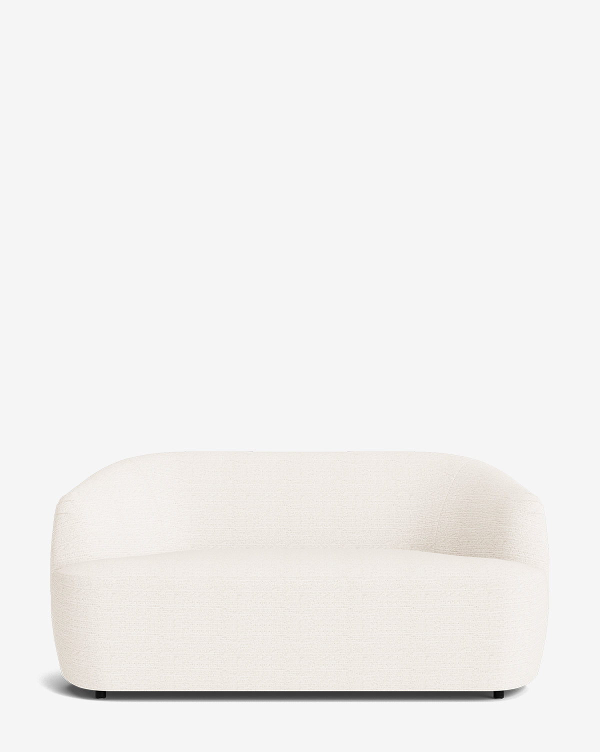 The Byron Settee 68 by Makerspalm is a modern, minimalist white custom fabric settee with smooth, rounded edges and a low backrest, shown against a plain white background. McGee & Co.
