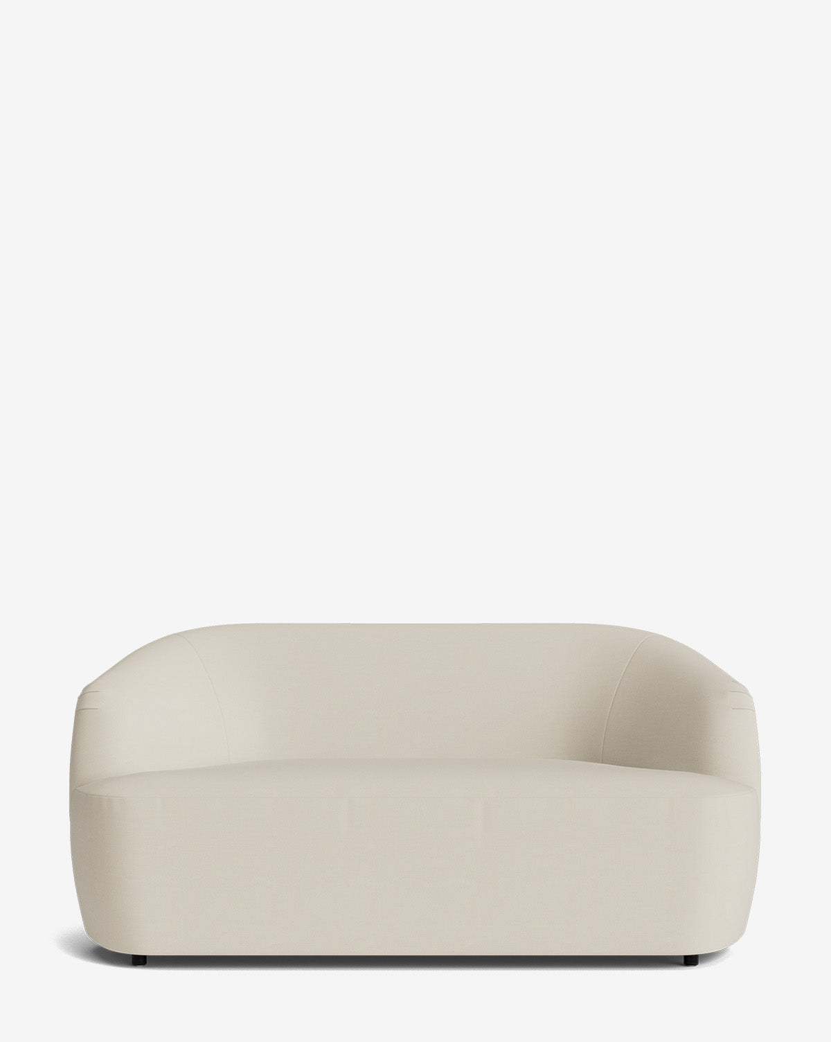 The Byron Settee 68 features a modern, minimalist design in beige, with rounded edges and a smooth upholstered surface, displayed against a plain white background, by McGee & Co.