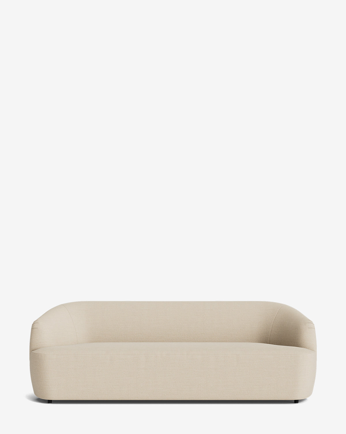 The Makerspalm Byron Sofa 96 is a modern, low-profile custom fabric sofa with rounded edges, a curved back, and minimalist design, shown against a plain white background by McGee & Co.