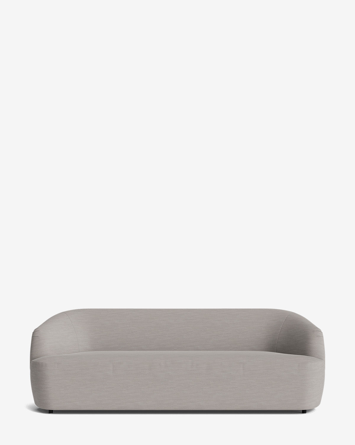 The Byron Sofa 96 showcases a minimalist, rounded design in light gray with smooth curves and a curved back silhouette, displayed against a plain white background by McGee & Co.