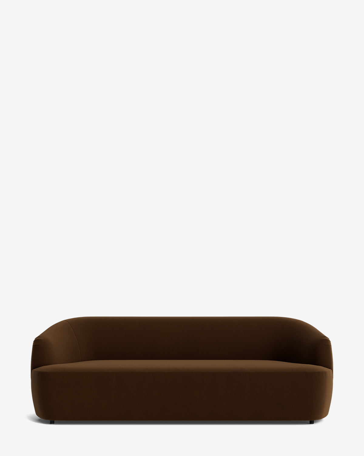 The Makerspalm Byron Sofa 96 is a modern, minimalist brown sofa featuring rounded edges and a low backrest, shown against a plain white background. McGee & Co.