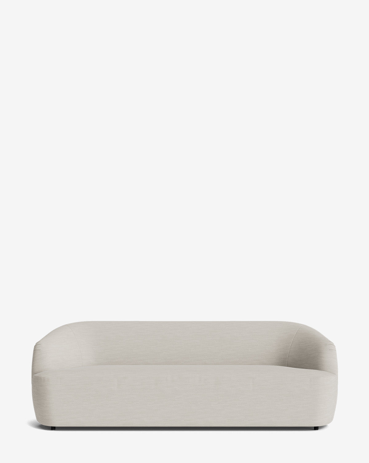 The Byron Sofa 96 in light beige has a modern, minimalist design with rounded edges and a low backrest, displayed on a plain white background, by McGee & Co.