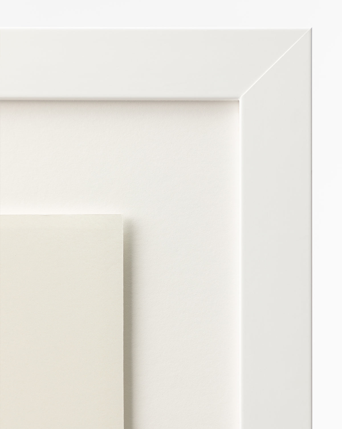 Close-up of the C’est La Vie art print in a white wood frame with white mat and off-white paper, set against a white background. Showcasing clean lines and minimalist style, it elevates any decor with timeless appeal, by McGee & Co.