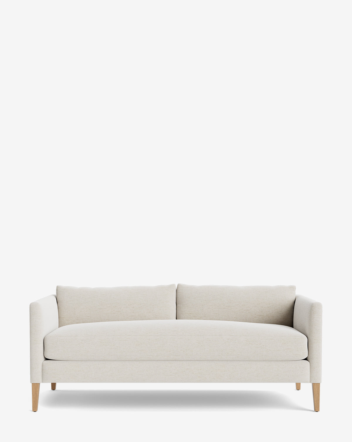 The Cade Sofa 80 features a modern, cream-colored design with clean lines, wooden legs, a low back, and two seat cushions, set against a plain white background by McGee & Co.