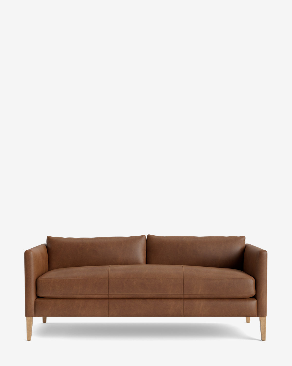 The Cade Sofa 80 features a modern design with brown leather upholstery, a single cushion seat, two back cushions, clean lines, and wooden legs, shown against a plain white background by McGee & Co.