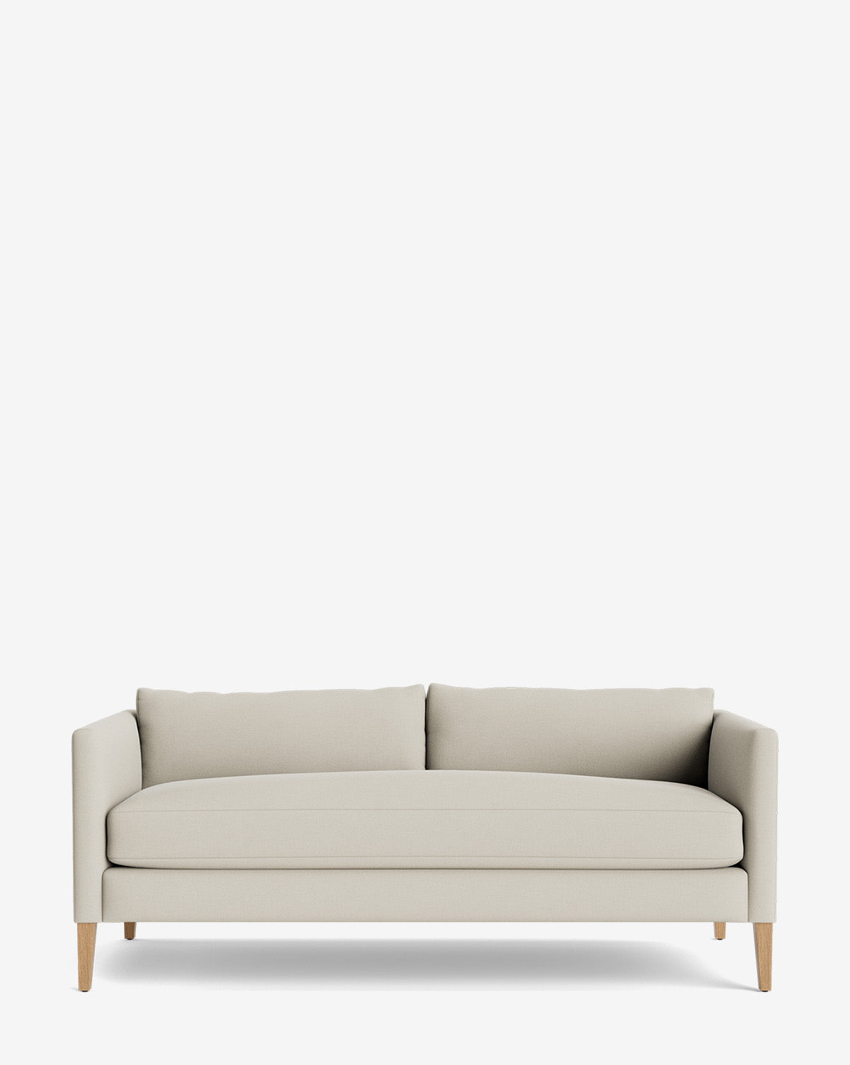 The Cade Sofa 80 is a modern, light beige single-cushion sofa with minimalist design, two back cushions, straight armrests, and wooden legs, set against a plain white background by McGee & Co.