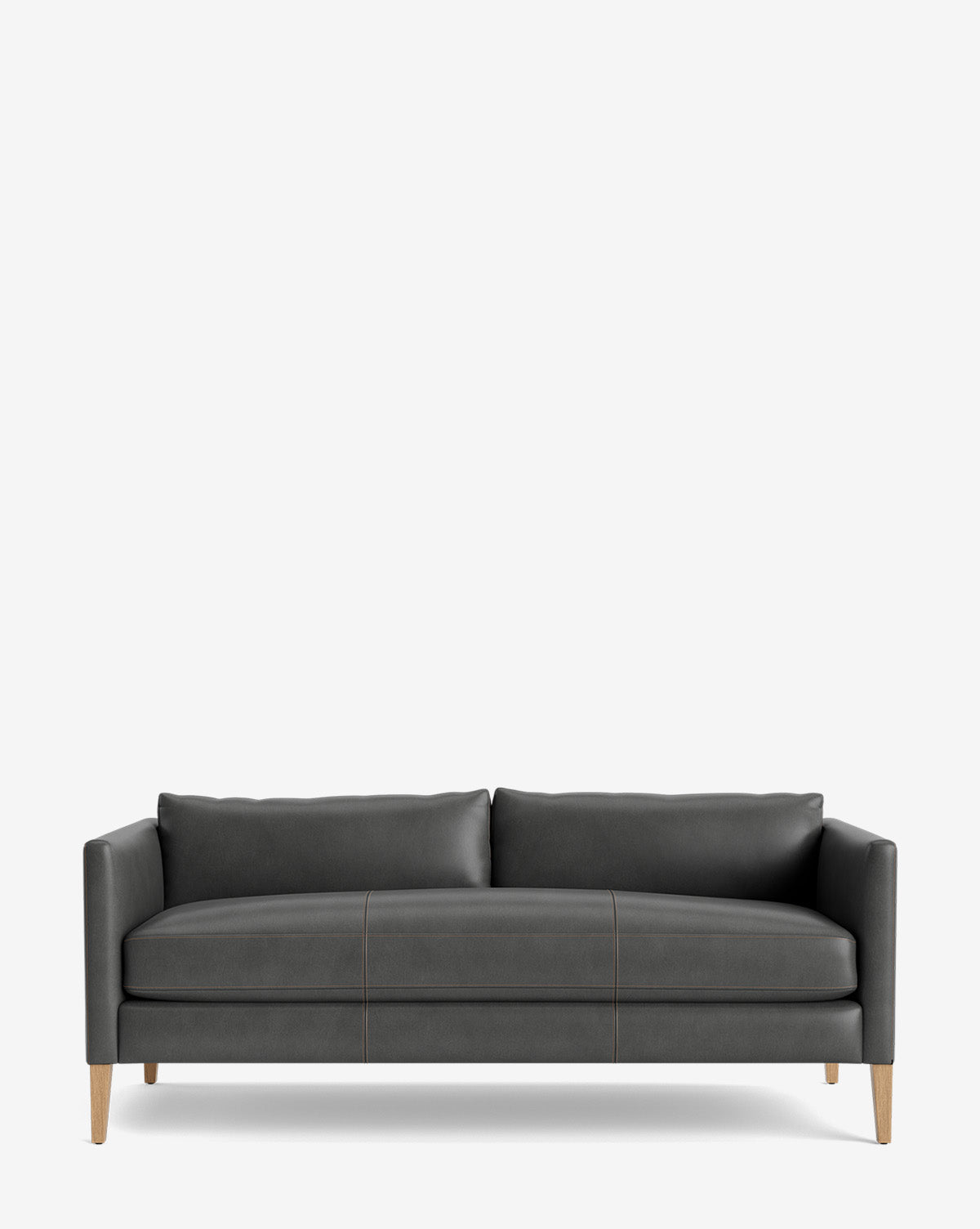 The Cade Sofa 80 is a modern down-wrapped dark gray leather sofa with wooden legs, straight arms, and two seat and back cushions, shown on a plain white background by McGee & Co.