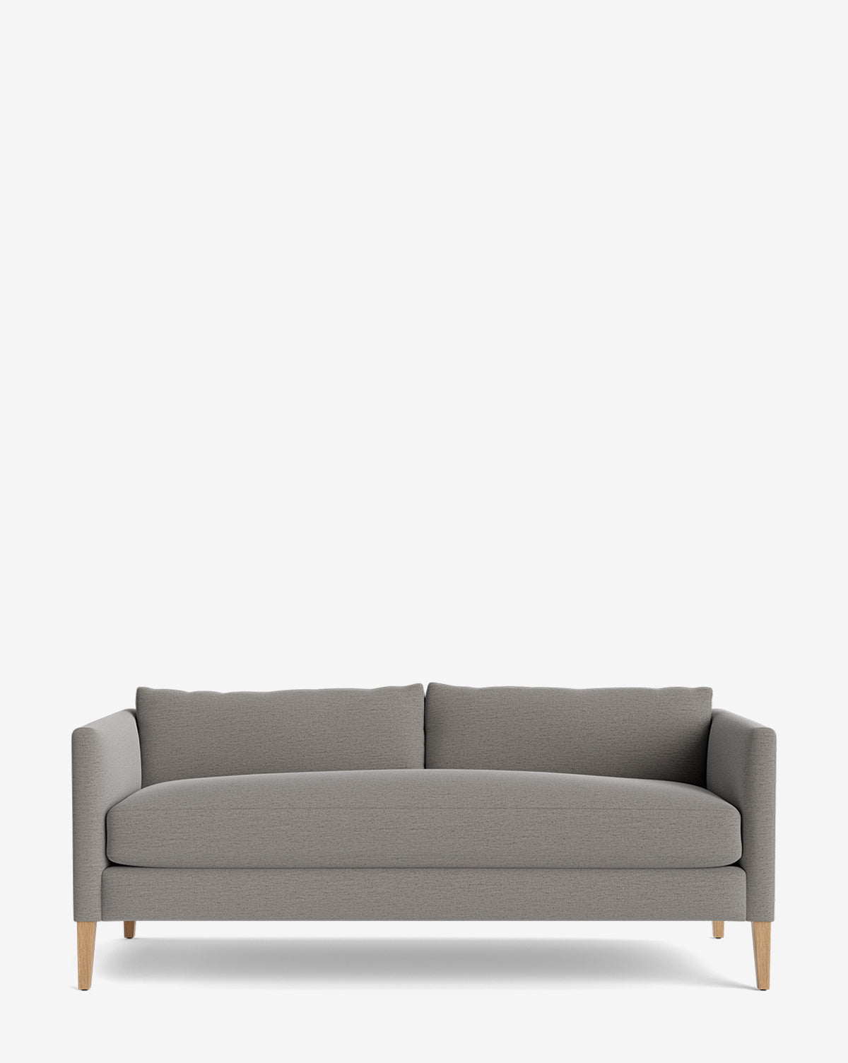 The Cade Sofa 80 is a modern, light gray down-wrapped sofa with straight arms, wooden legs, and two back cushions, shown against a plain white background by McGee & Co.