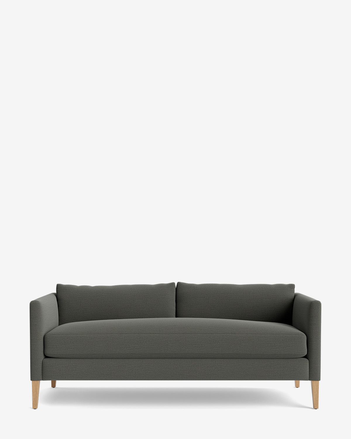 The Cade Sofa 80 in dark gray upholstery features slim, straight arms and light wooden legs. With two back cushions and a down-wrapped finish, this minimalist sofa provides contemporary comfort against a plain white background by McGee & Co.