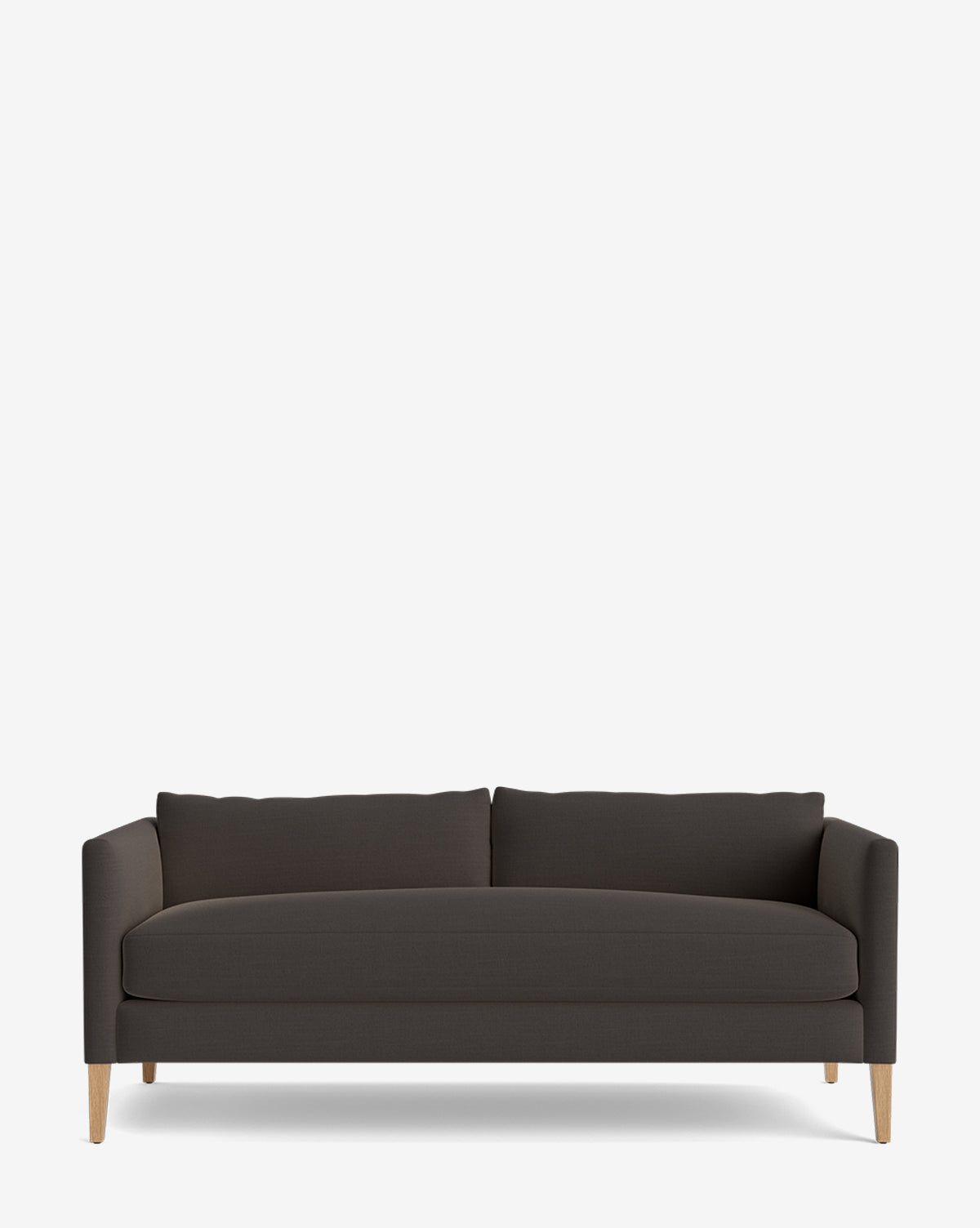 The Cade Sofa 80 is a modern, dark gray single-cushion sofa with clean lines, low arms, wooden legs, and two down-wrapped back cushions, shown against a plain white background by McGee & Co.