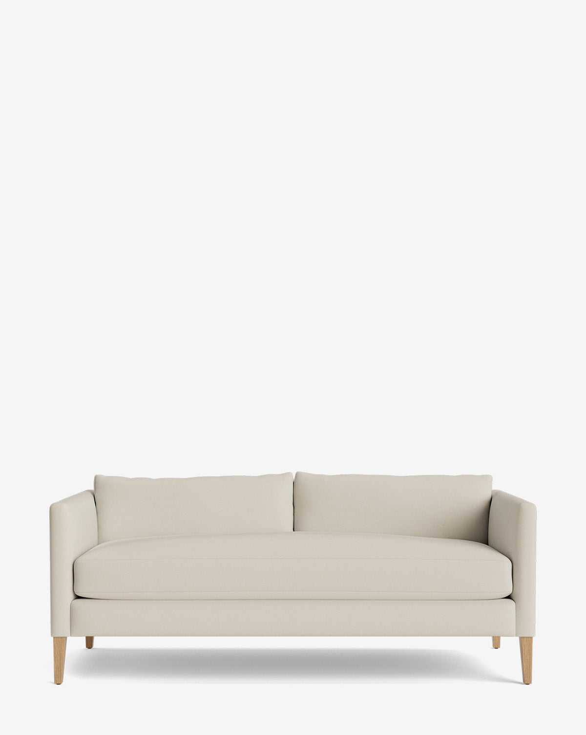 The Cade Sofa 80 is a modern, light beige sofa with clean lines, a low backrest, two back cushions, down-wrapped seats, and slightly tapered wooden legs, shown against a plain white background by McGee & Co.
