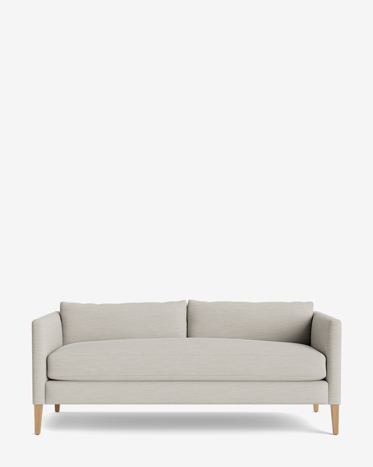 The Cade Sofa 80 features a modern design with light gray upholstery, wooden legs, straight arms, and two down-wrapped back cushions, shown against a plain white background by McGee & Co.
