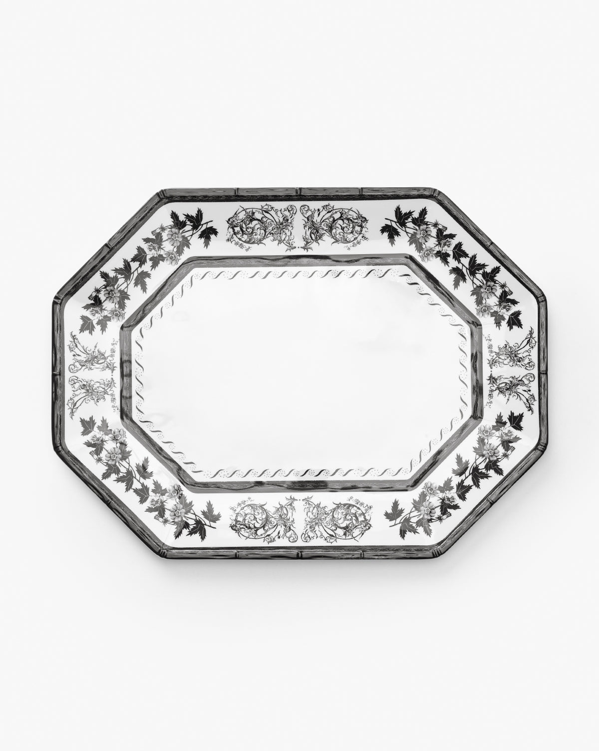 The Calanthe Melamine Serving Platter features a shatter-resistant, rectangular octagon design with an elegant black floral border on a crisp white background, by McGee & Co.