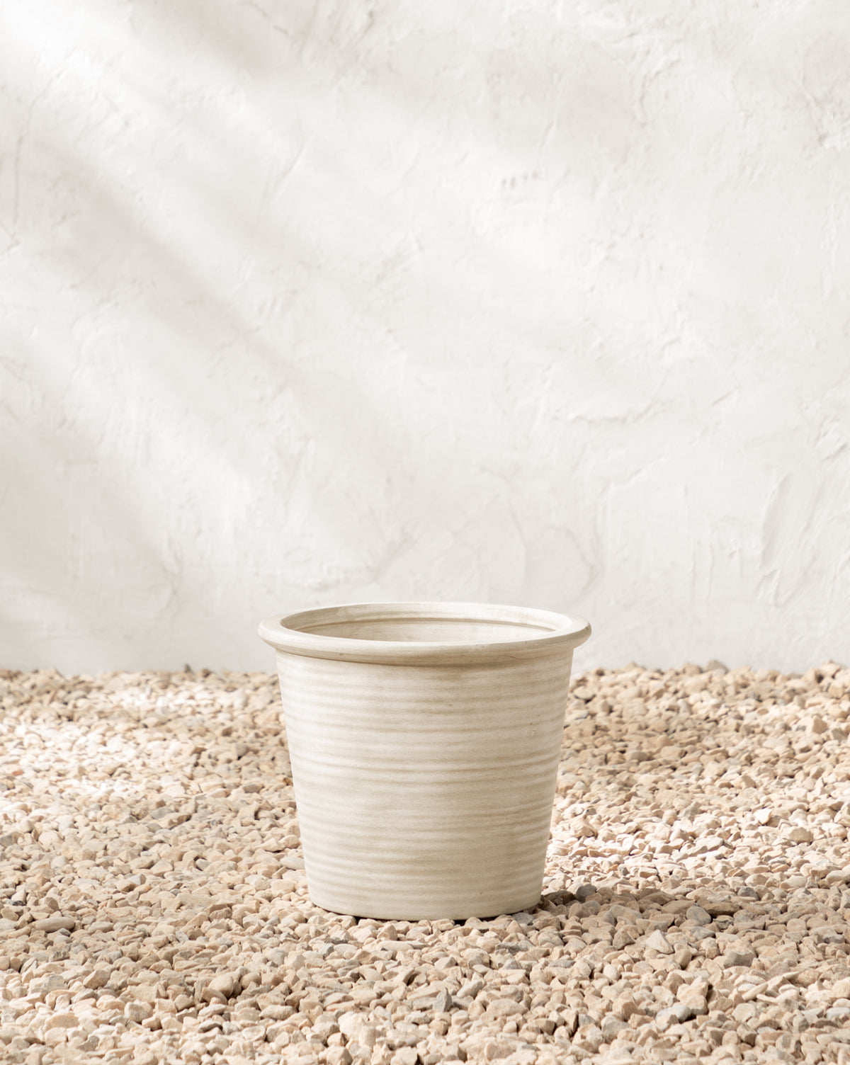 13.5” Dia. x 11.5” H ceramic planter ideal for medium-sized outdoor plants, from McGee & Co.