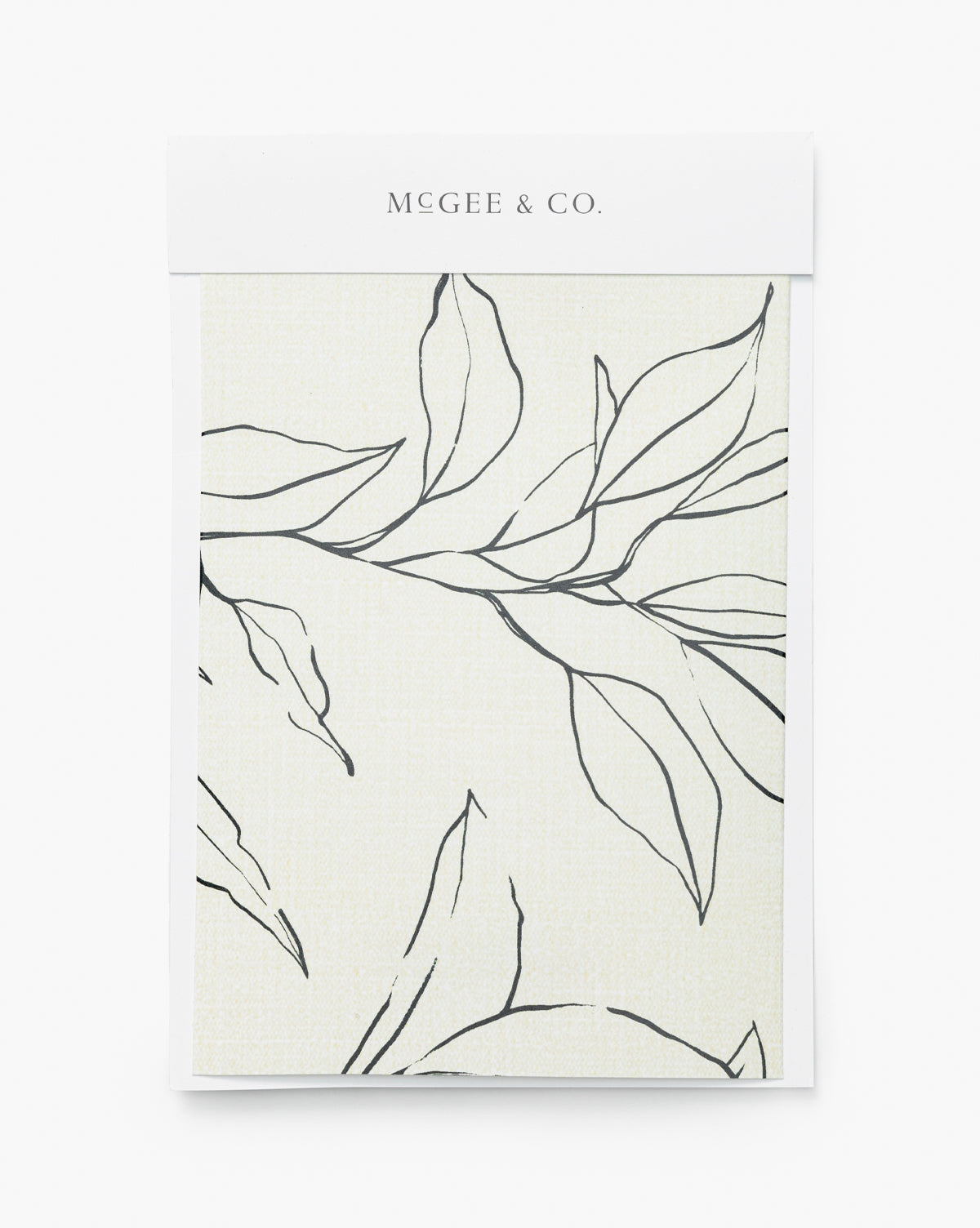Certainly! Here’s your revised sentence with the exact string McGee & Co. blended in at the end: A wallpaper swatch featuring a simple black floral print on a light background, crafted by McGee & Co. as the Cecile Floral Print Wallpaper Swatch, McGee & Co.
