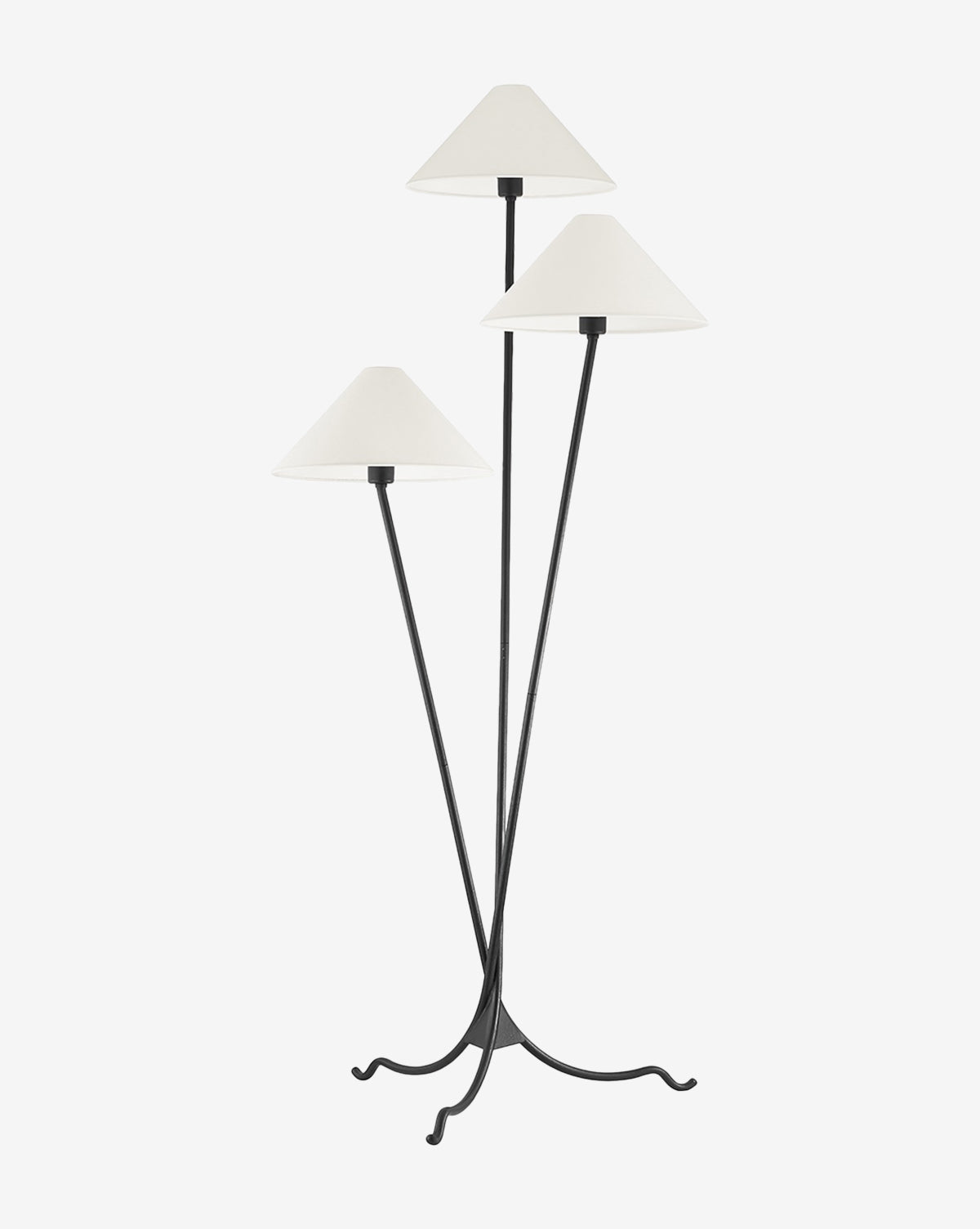 The Cedar Floor Lamp by Troy Lighting features three slender black metal rods, white cone-shaped lampshades, and a tripod base with curved feet—ideal for adding modern elegance to your living room. McGee & Co.