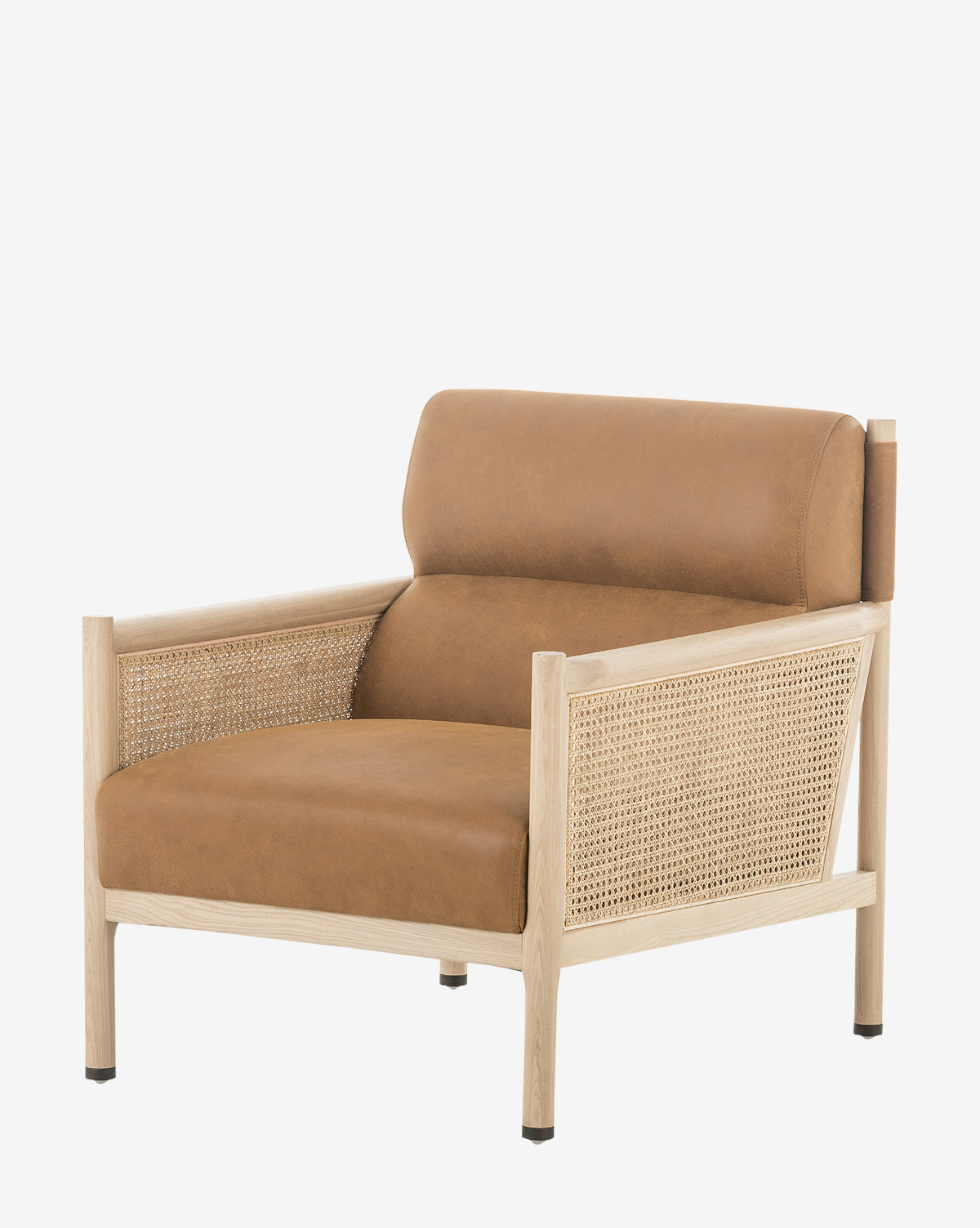 The Channing Lounge Chair features a light wood frame, woven cane side panels, and tan high-performance leather cushions on the seat and back, shown against a plain white background by McGee & Co.