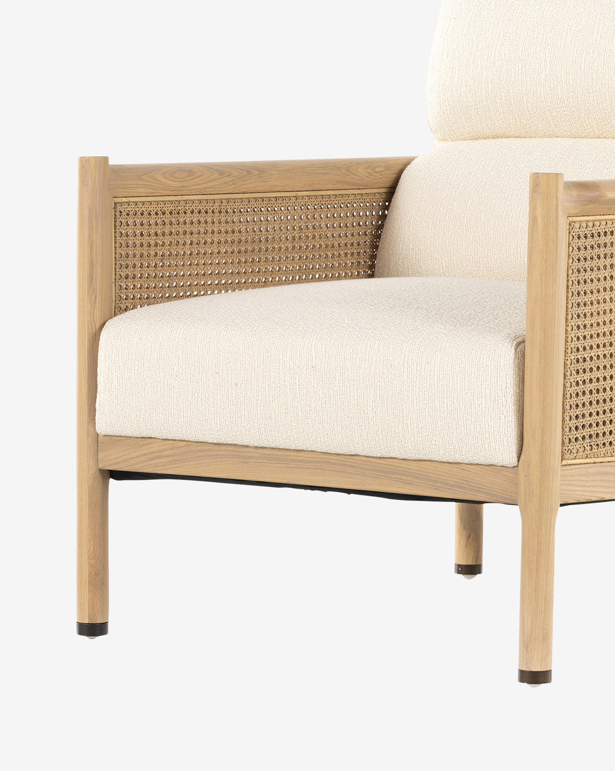The Channing Lounge Chair features Parisian-inspired design with a light wood frame, woven cane panels, and cream high-performance upholstered seat and back cushions, by McGee & Co.