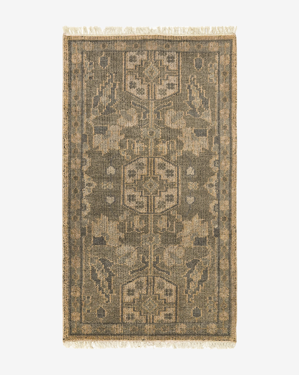 The Chevalier Hand-Knotted Wool Rug showcases an intricate geometric and floral design in muted green, beige, and brown tones, finished with short, light-colored fringe on the ends for a touch of timeless elegance, by McGee & Co.