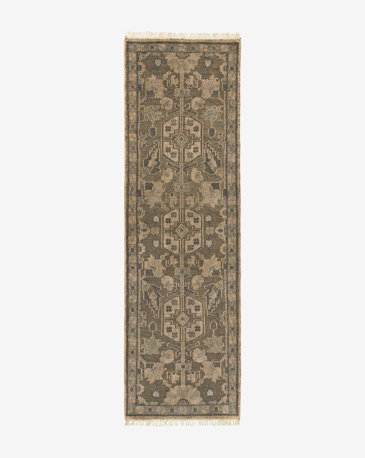 The Chevalier Hand-Knotted Wool Rug features a rectangular shape, traditional floral and geometric patterns in muted brown, beige, and olive green tones, and fringed edges on the shorter sides for timeless elegance, by McGee & Co.