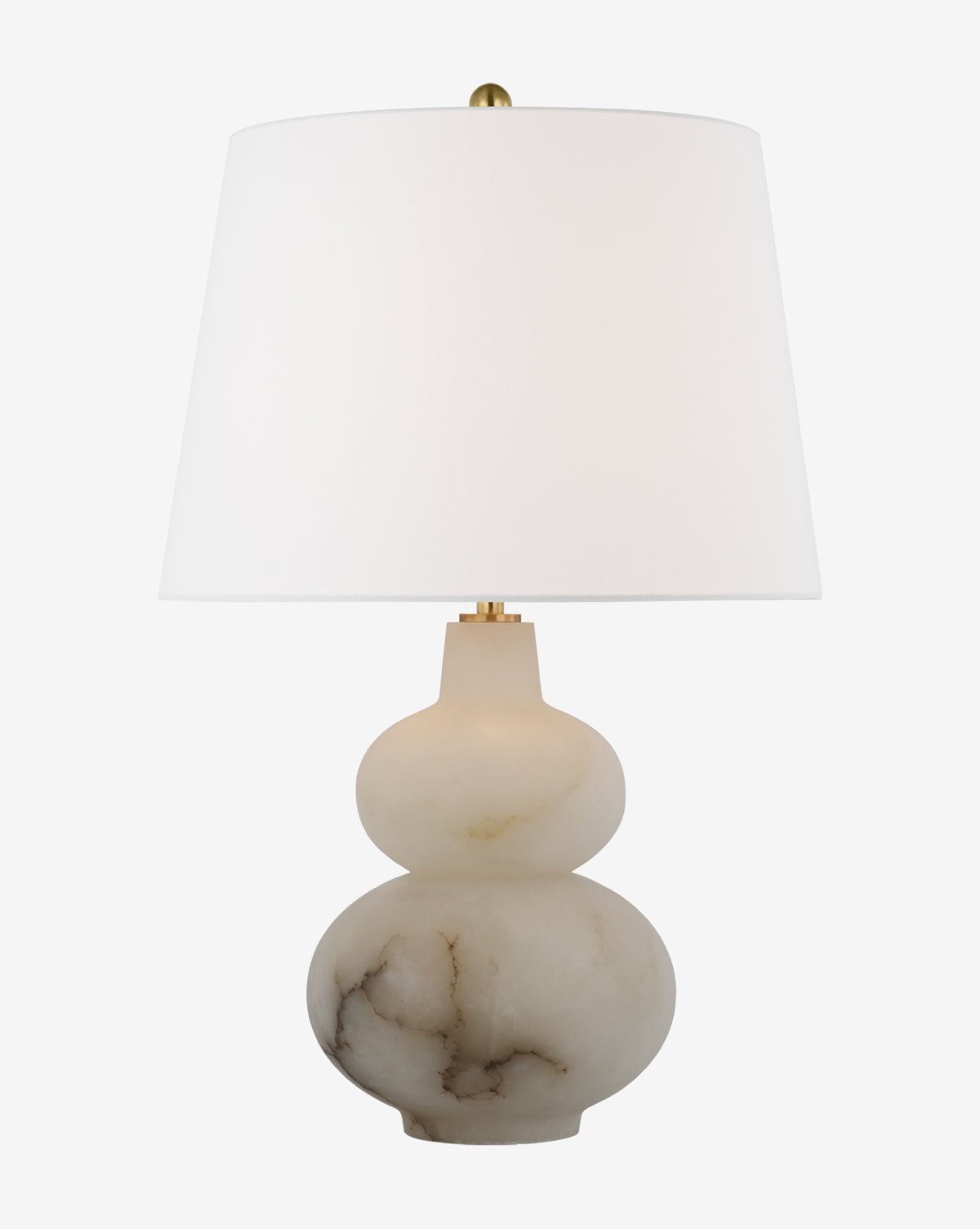 The Ciccio Table Lamp showcases a double-gourd-shaped natural alabaster base with bold dark veining and is finished with a clean white linen shade, by McGee & Co.