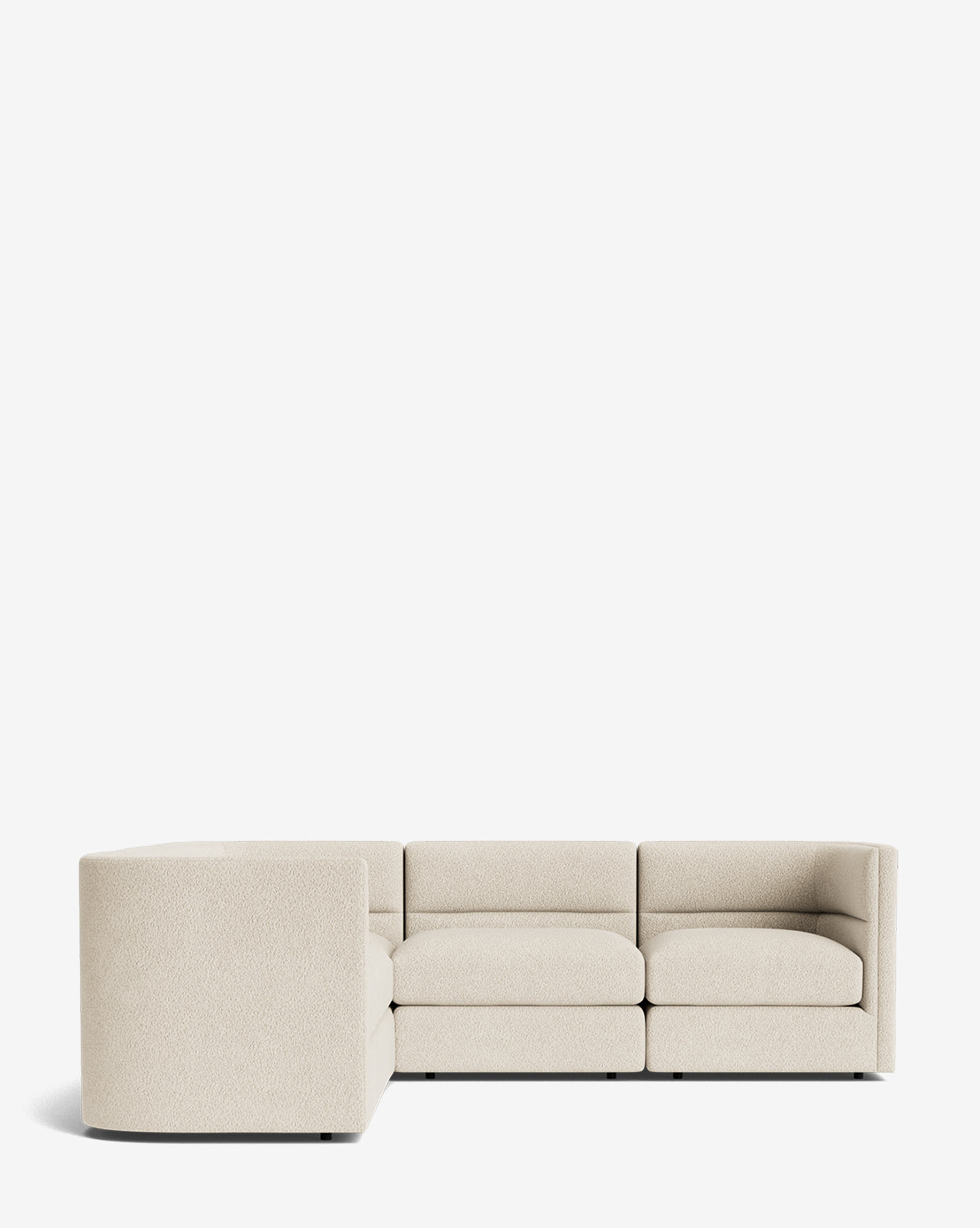 The Makerspalm Claremont Modular L Sectional 99 in light beige features clean lines and low-profile backrests, shown against a white background. This customizable fabric sectional adds versatile style to any living space. McGee & Co.