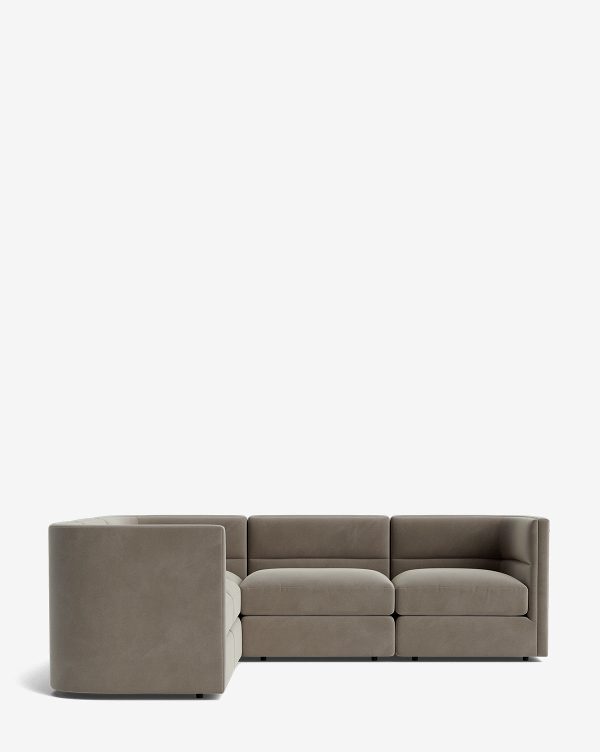 The Makerspalm Claremont Modular L Sectional 99 is a modern, low-profile sofa with three seat cushions per side, upholstered in light gray fabric and customizable to fit your space, shown against a white background. McGee & Co.