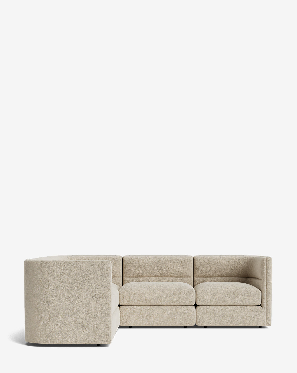 The Makerspalm Claremont Modular L Sectional 99 is a modern, beige fabric sofa with low boxy arms and plush cushions, shown against a white background—combining customizable comfort with contemporary style. McGee & Co.