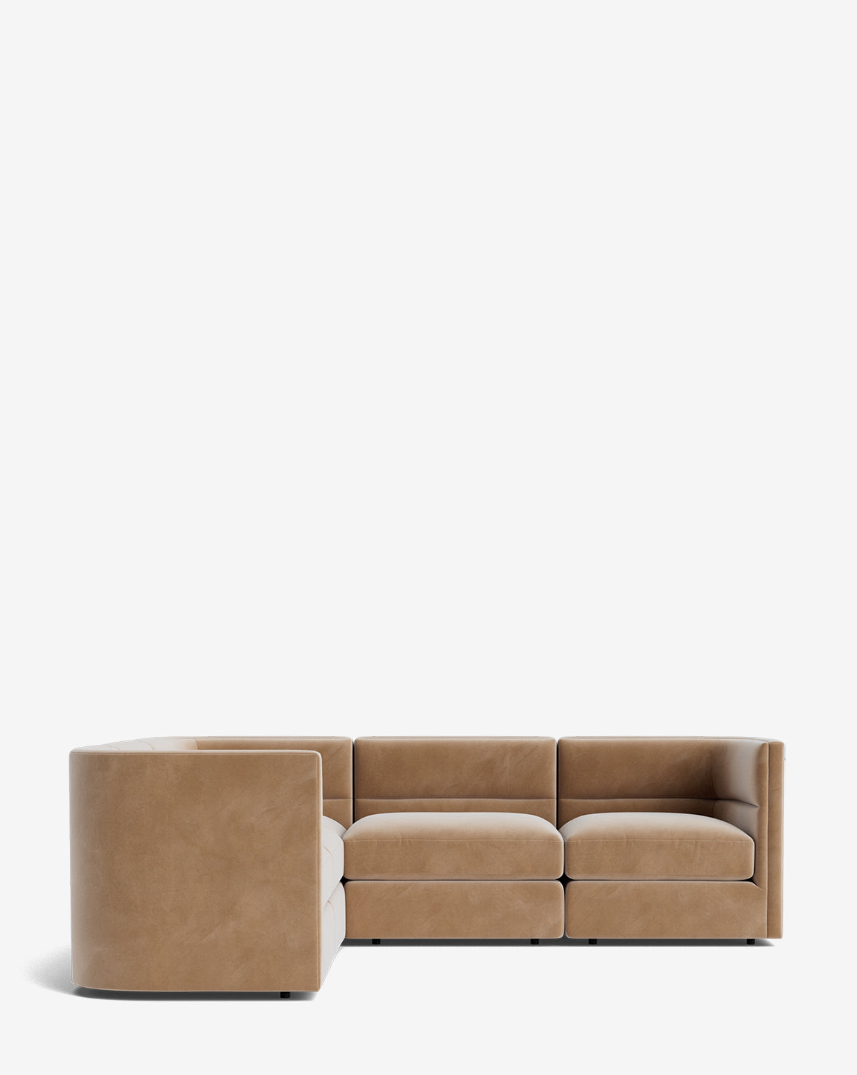 The Makerspalm Claremont Modular L Sectional 99 features a modern tan leather design with plush cushions and low, smooth armrests, shown against a plain white background. McGee & Co.