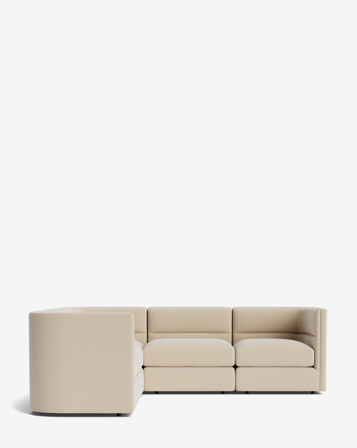 The Makerspalm Claremont Modular L Sectional 99 features light beige fabric, clean lines, and a low backrest, offering customizable comfort and modern style that adapts seamlessly to your space. McGee & Co.