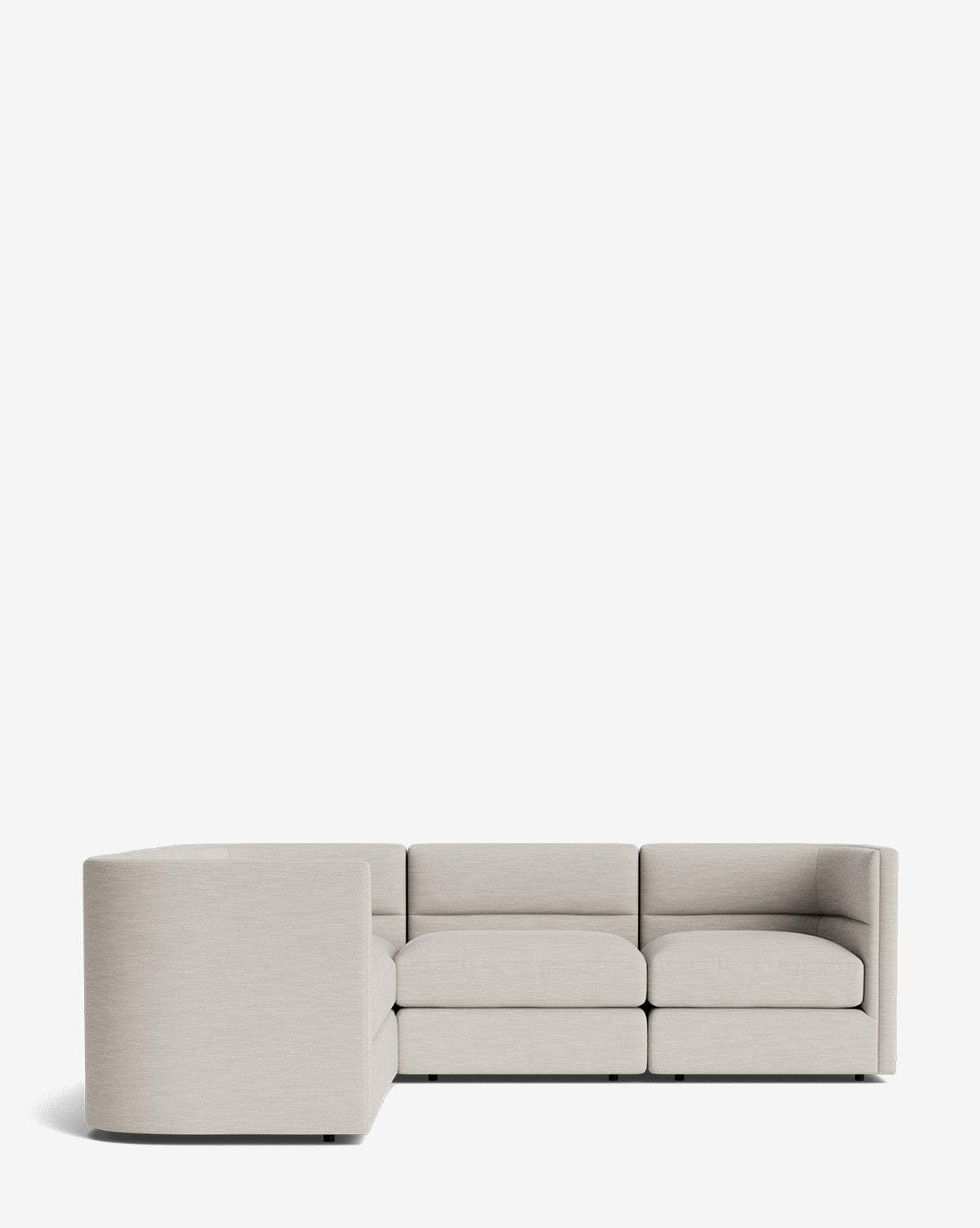 The Claremont Modular L Sectional 99 features a modern, light gray fabric design with low backs and clean lines, arranged in an L-shape against a plain white background, by McGee & Co.