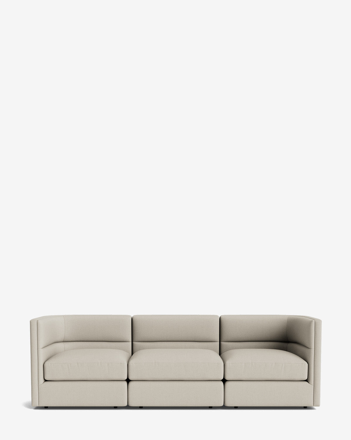 The Claremont Modular Sofa 99 is a modern, light beige three-seater with low arms and a minimalist design, providing luxurious comfort on a plain white background by McGee & Co.