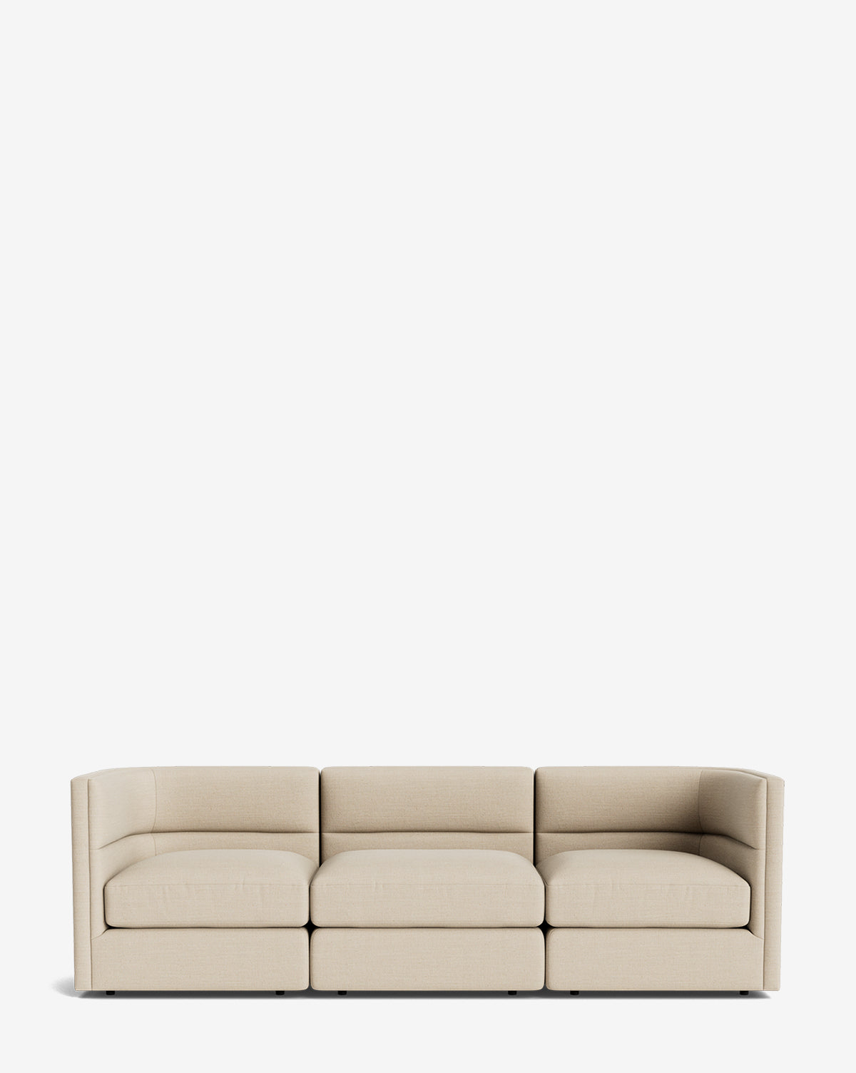 The Makerspalm Claremont Modular Sofa 99 is a modern, beige three-seater with clean lines and low armrests, shown against a plain white background. McGee & Co.